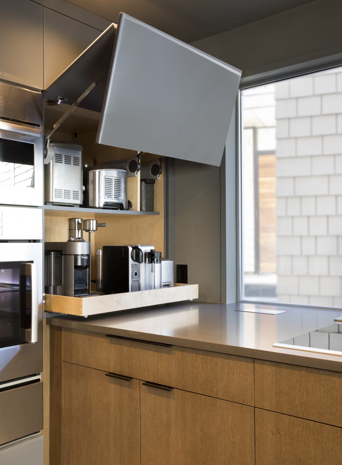 Biltmore kitchen appliance garage with lift-up cabinet and oak base cabinets