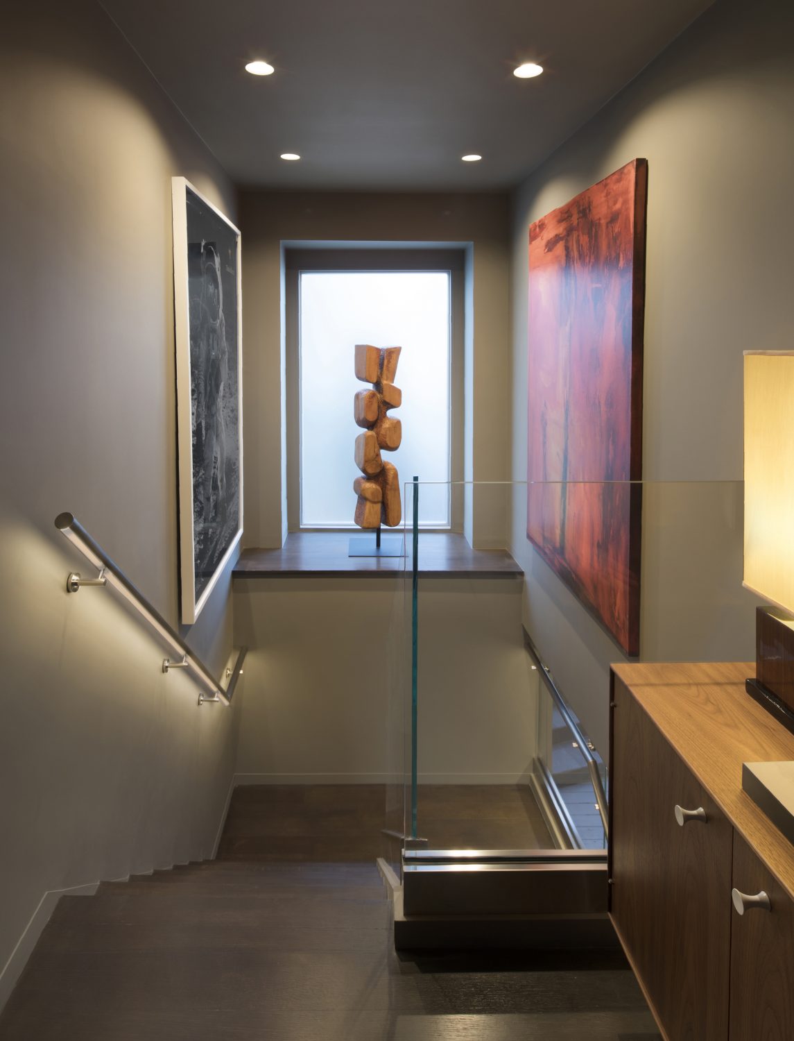 Biltmore stairwell landing with sculpture and contemporary artwork