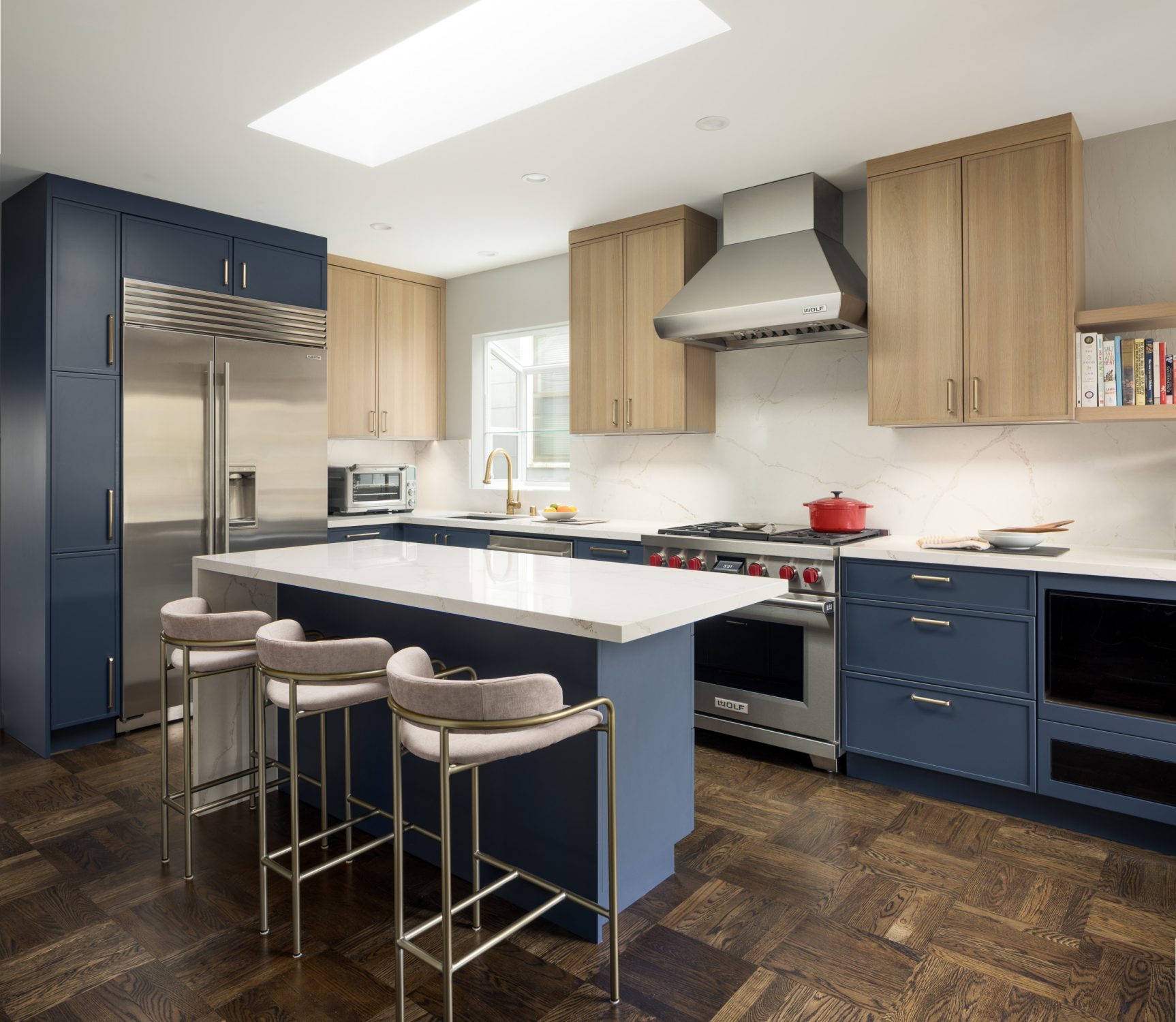 Scottsdale kitchen angle showing the stainless refrigerator and island seating
